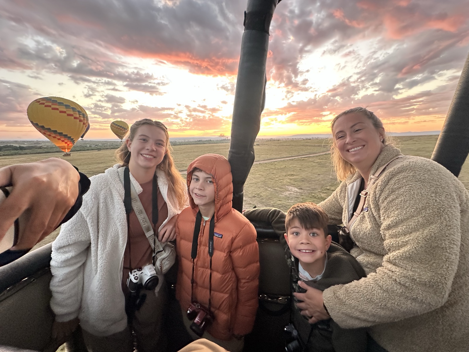 In the balloon basket at sunrise, with another balloon behind us