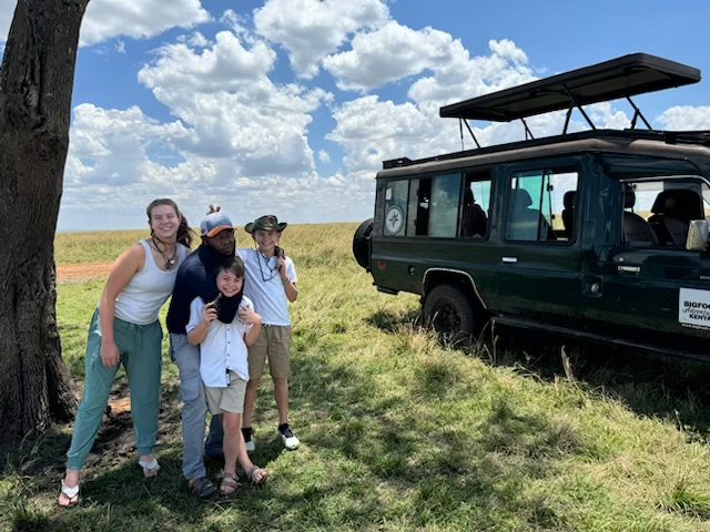Next to our Land Cruiser in the Maasai Mara