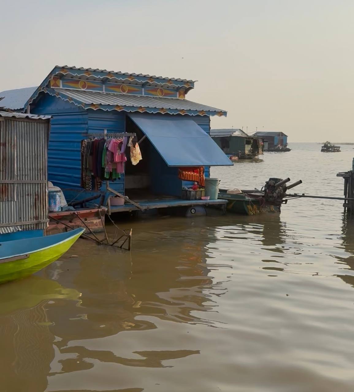 Blue Floating Shack with Laundry